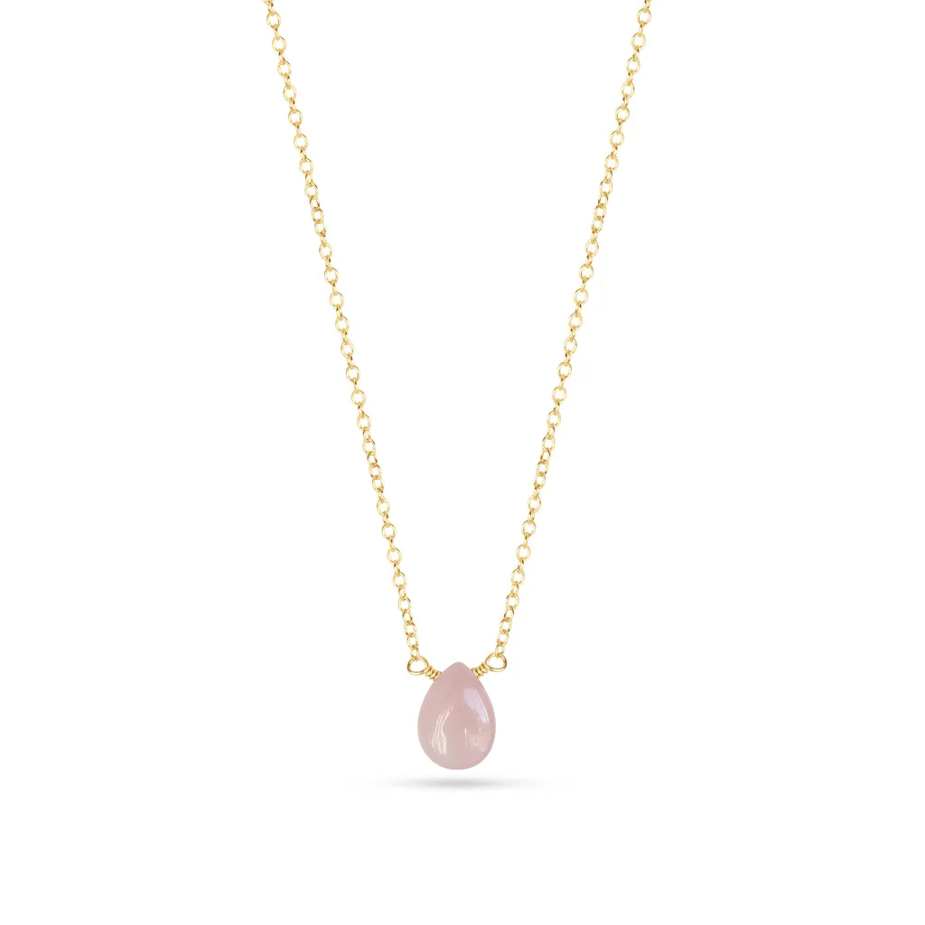 Rose quartz teardrop pendant on a delicate gold chain